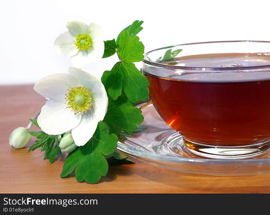 Bouquet of spring flowers and tea