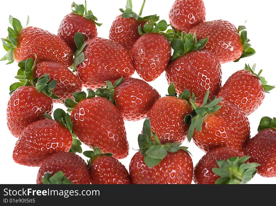 Red strawberry fruits isolated on white background