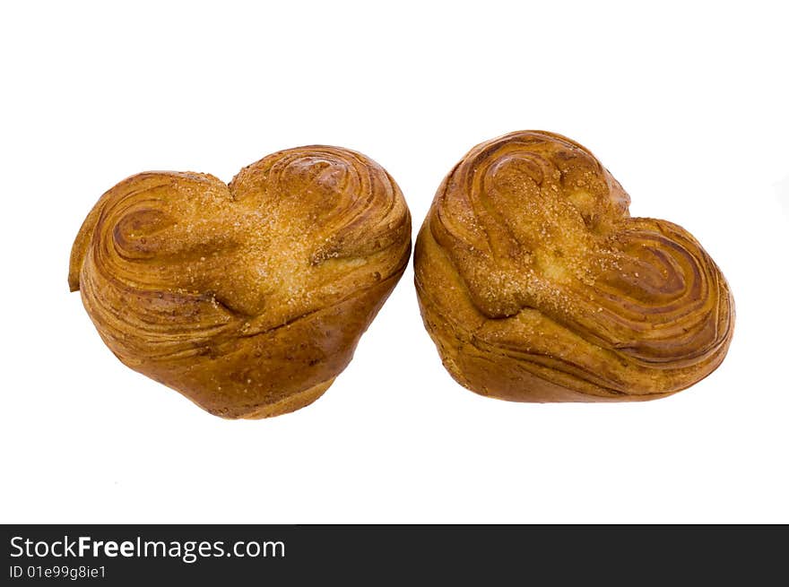 Rich roll in the form of heart on a white background. Rich roll in the form of heart on a white background