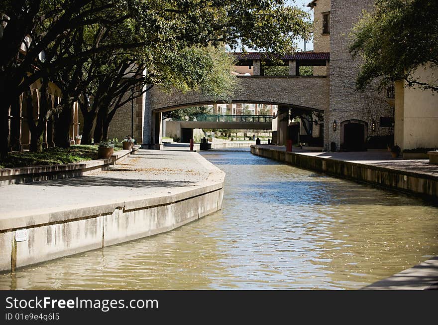 An image of a river running through a business park area