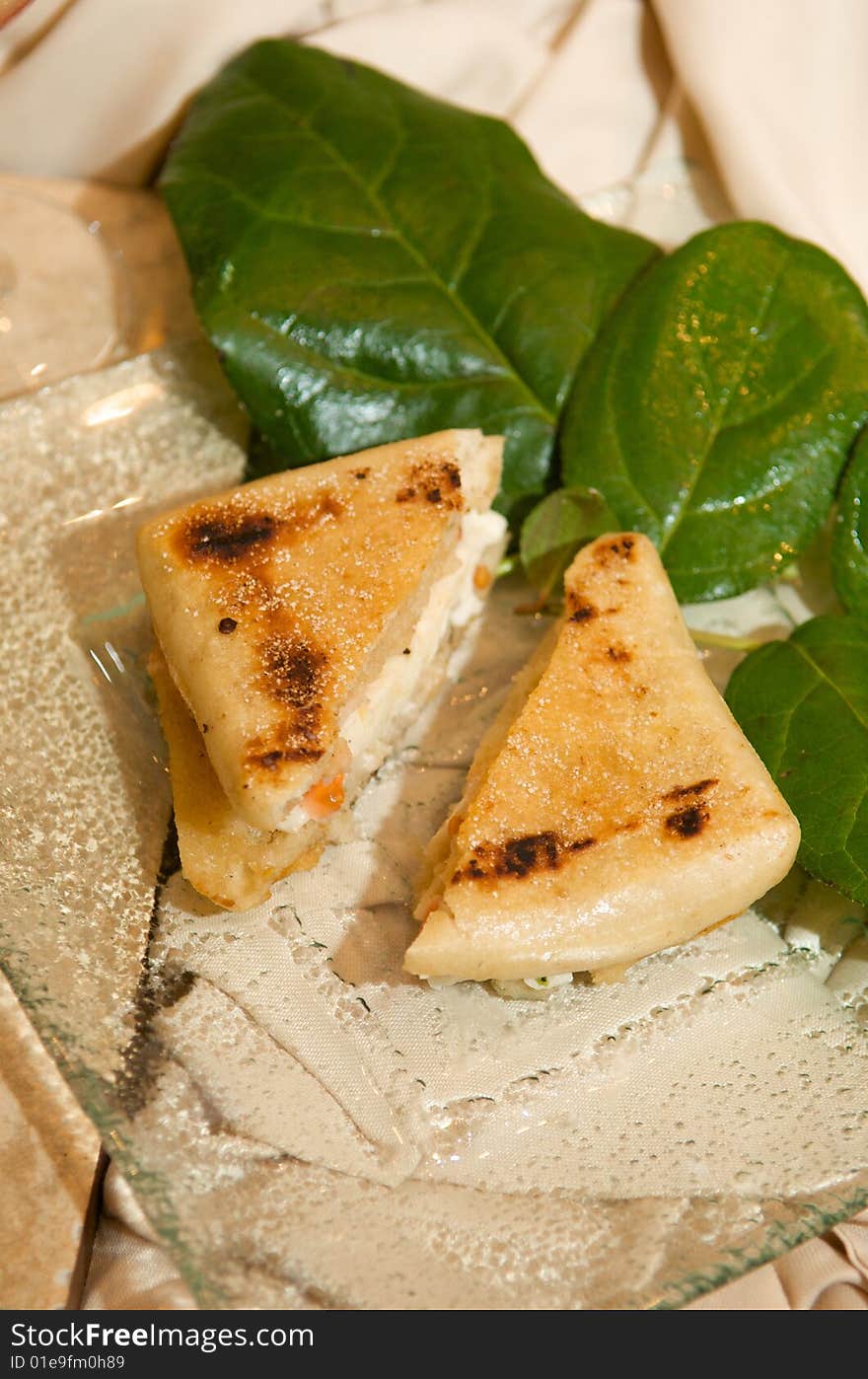 An up close image of toasted cheese sandwhich starter. An up close image of toasted cheese sandwhich starter