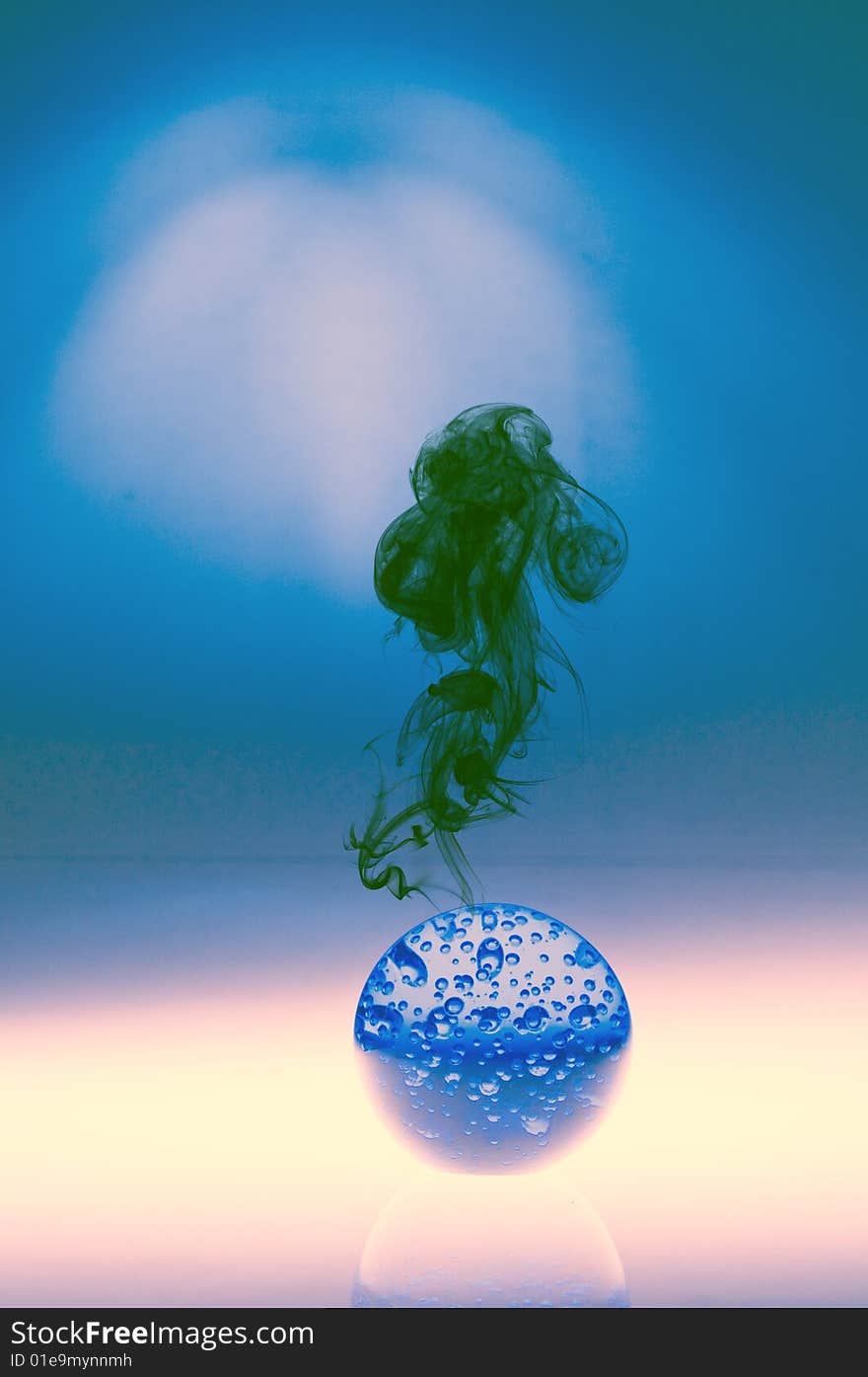 Blue globe with smoke