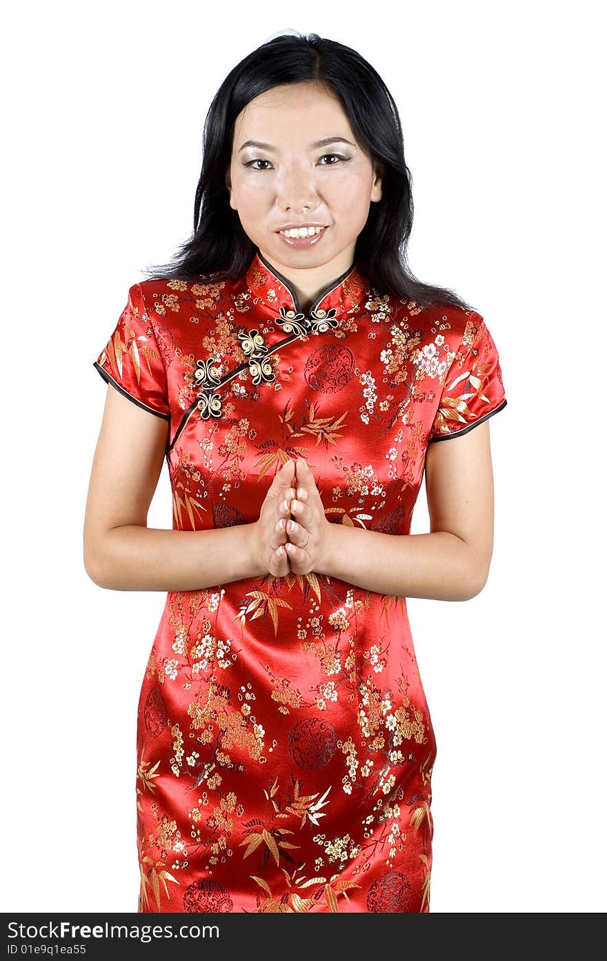 Chinese girl in traditional dress - QiPao, preparing for celebration of Chinese New Year in Shanghai, China. Chinese girl in traditional dress - QiPao, preparing for celebration of Chinese New Year in Shanghai, China.