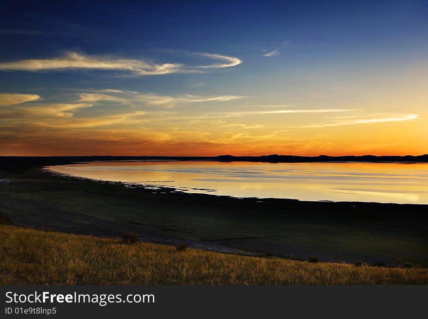 Sunset at the lake in beautiful colors. Sunset at the lake in beautiful colors