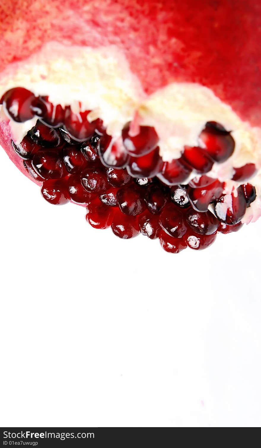 A beautiful picture of ripe pomegranate isolated on a white background