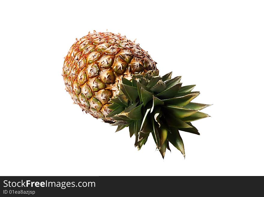 A beautiful picture of ripe pineapple isolated on a white background