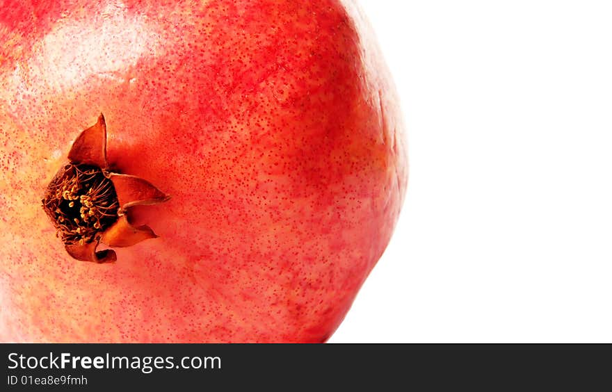 A beautiful picture of ripe pomegranate isolated on a white background