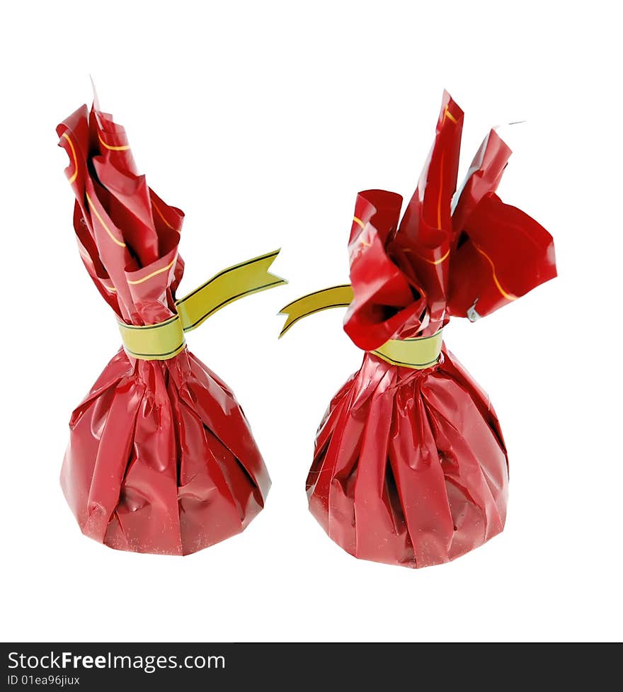 Two candies in the red packaging on a white background