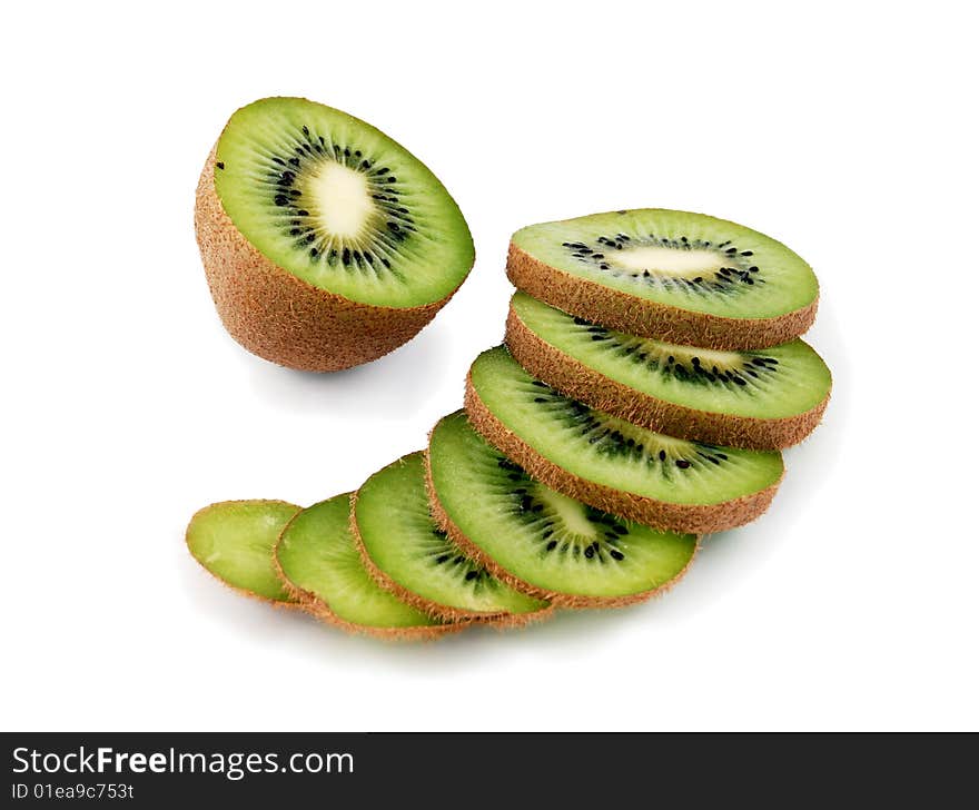 Beautiful green texture consisting of slices of kiwifruit on a white background