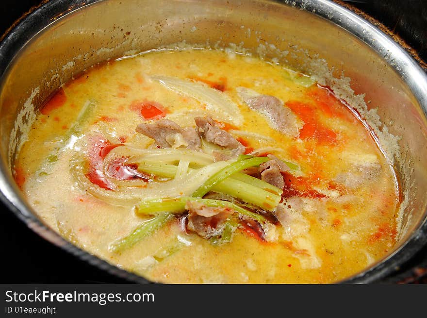 Hot soup with black background