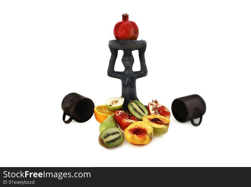 Figurine and fruit