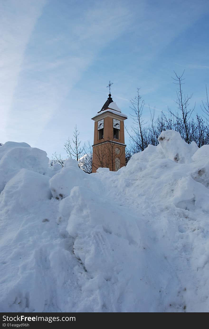 Alpine belfry in winter