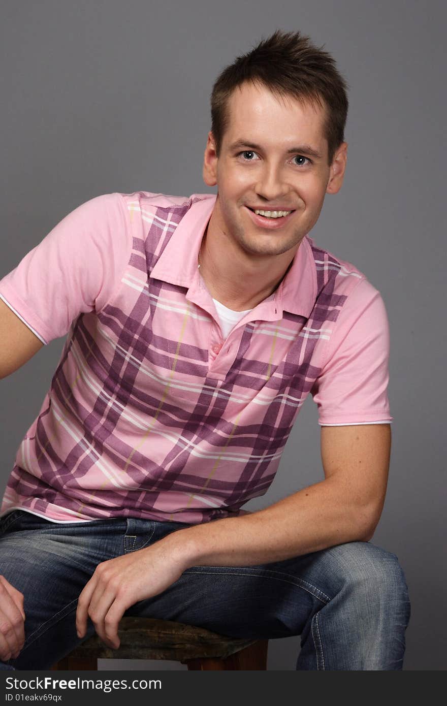 Young man on a black background. Young man on a black background