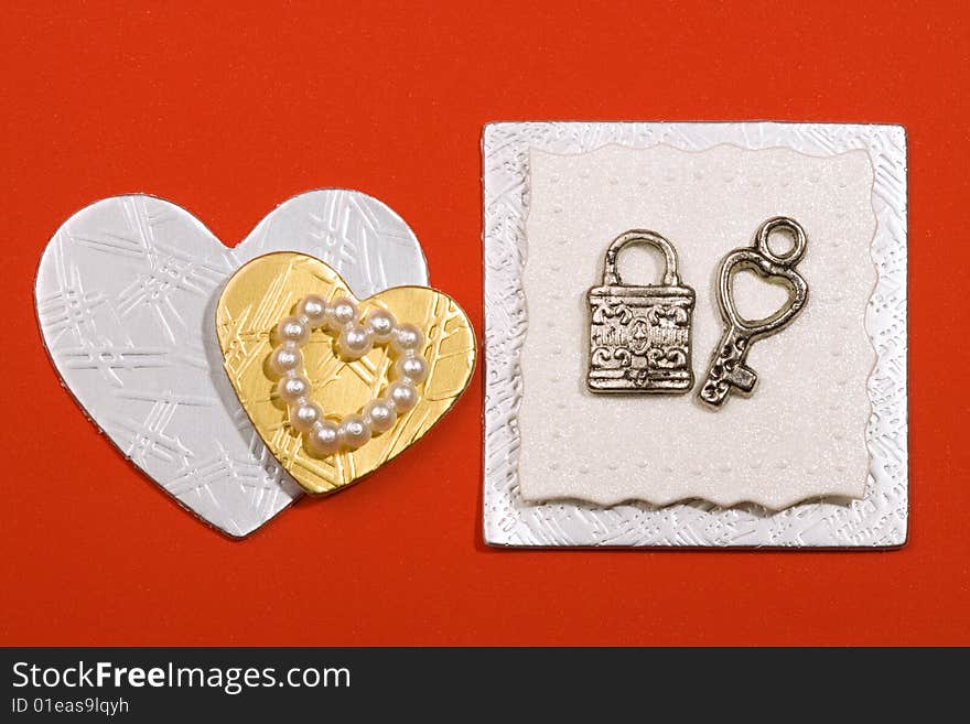 Accessories for congratulation card are lock, key, hearts