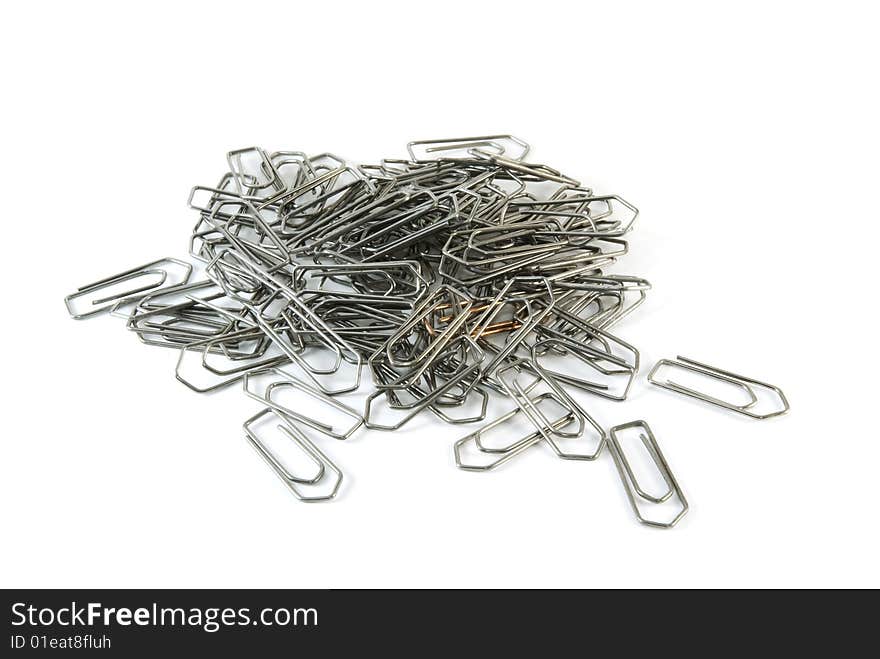 A stack of safety pins isolated on white background