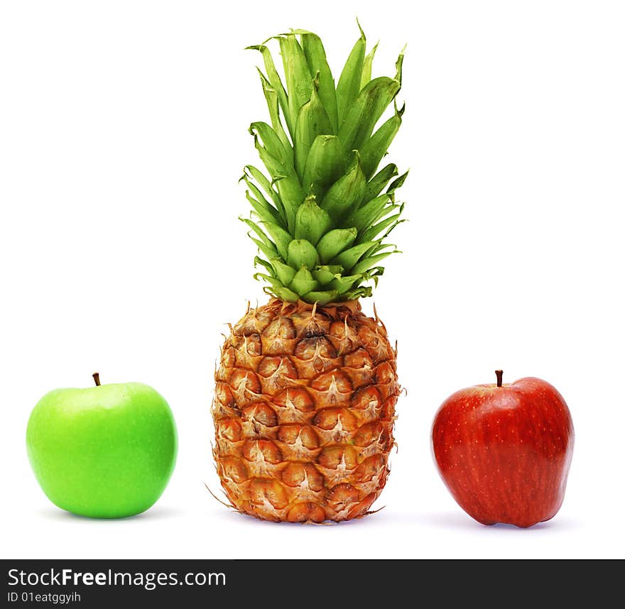 Fresh apples and pineapple isolated on white background