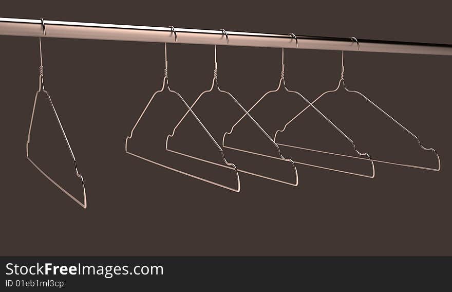 Metallic hangers on the brown background.