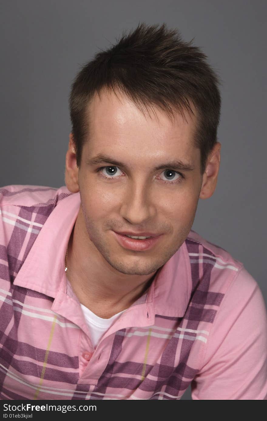 Young man on a black background. Young man on a black background