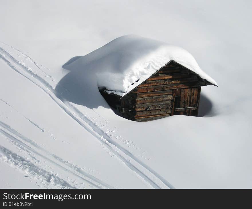 Cottage In The Snow