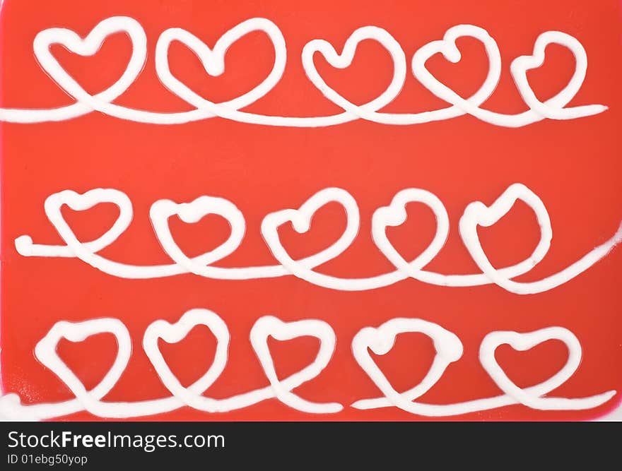 White hearts on red background