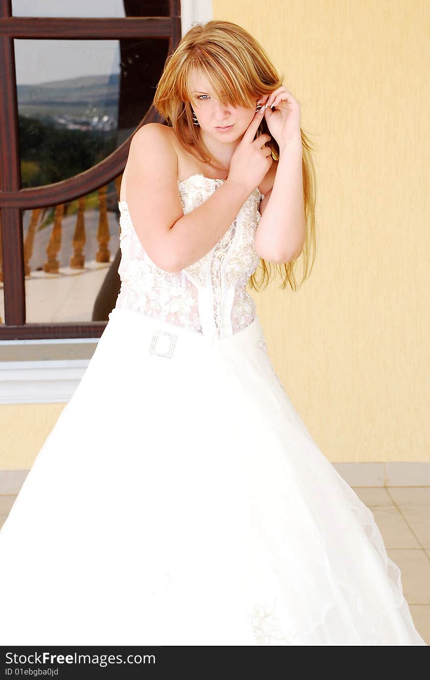 The happy girl in a wedding dress