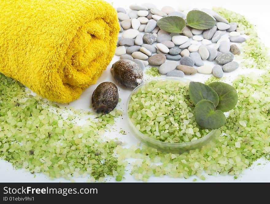 Herbal salt and towel. spa and body care background. Herbal salt and towel. spa and body care background