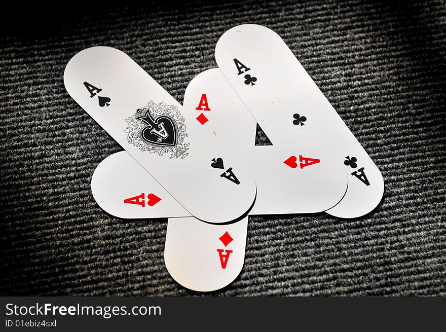 Aces cards isolated on black.