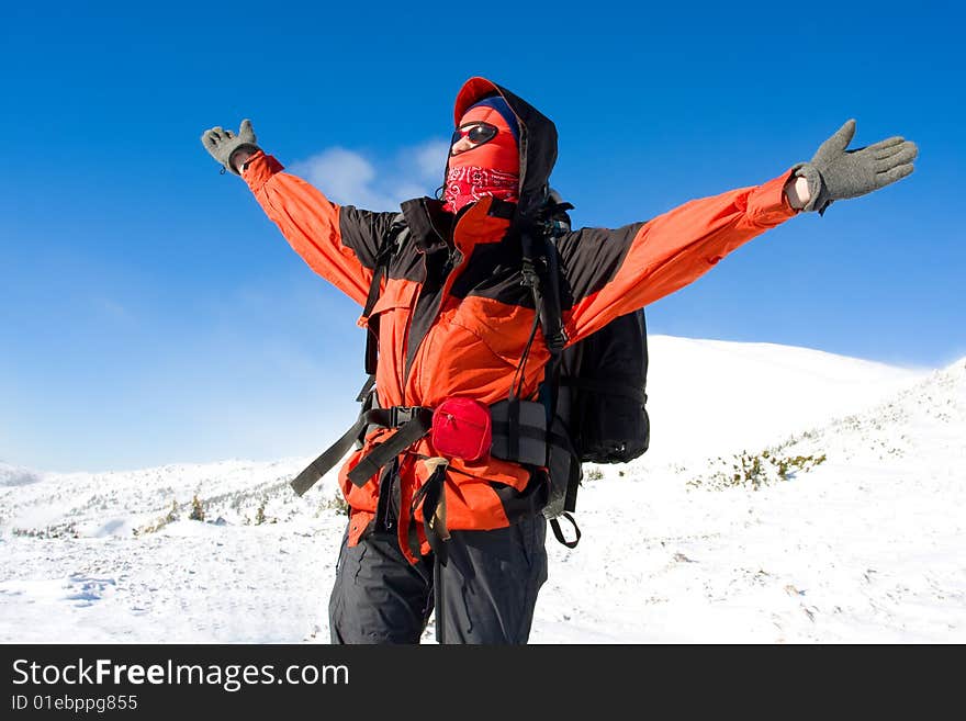 Hiker are in winter in mountains