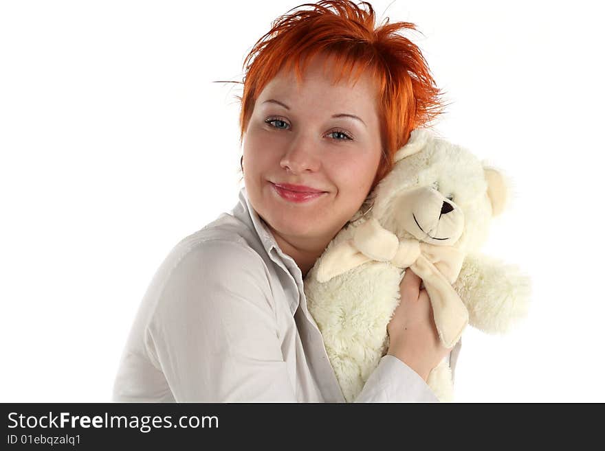 Red haired woman with teddy bear isolated on white background