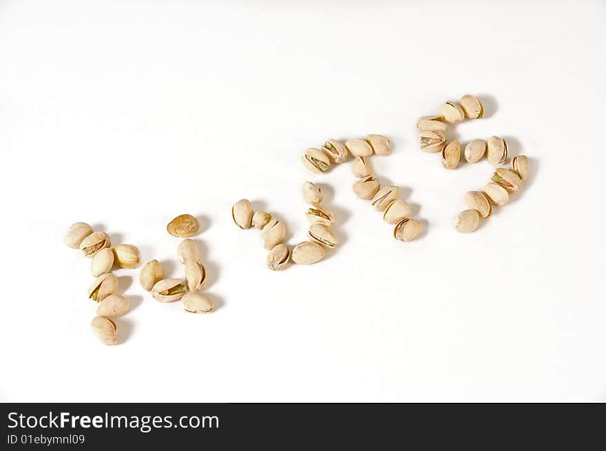 Pistachio nuts isolated on white