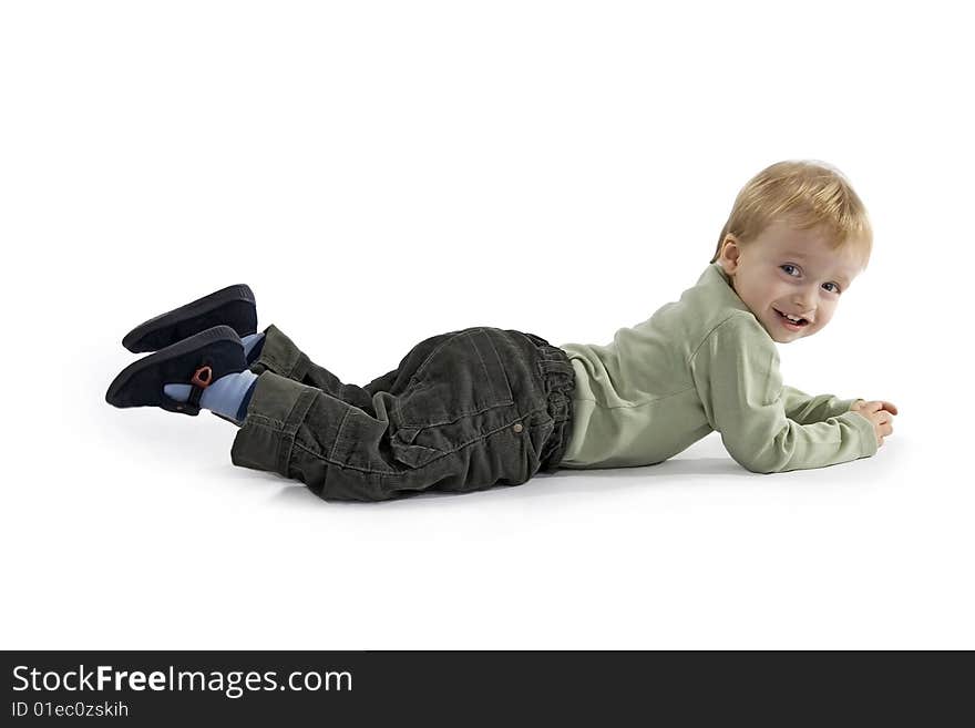 Merry recumbent boy on egg white background. Merry recumbent boy on egg white background