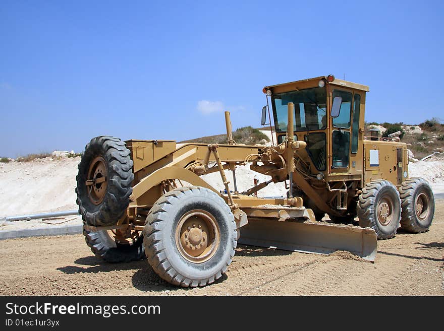 Tractor on Road construction
, paving new road