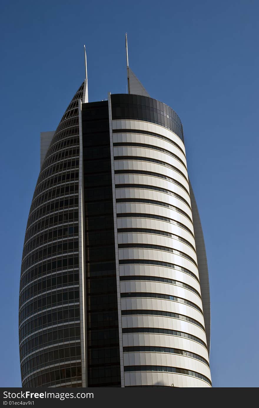 Looking upward on a high modern office building. Looking upward on a high modern office building