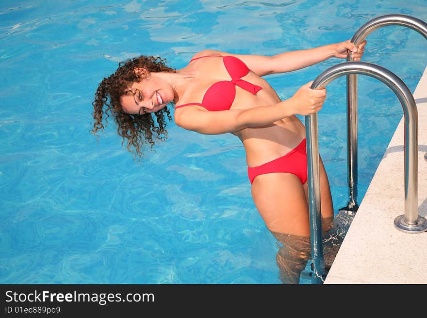 Young woman in basin stair