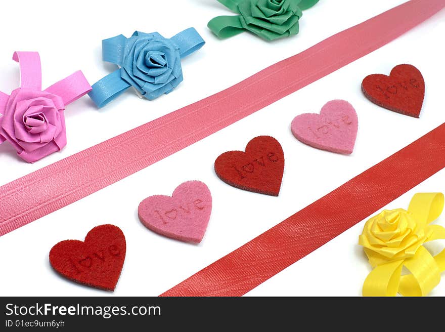 Blue, pink and yellow bows and hearts. Blue, pink and yellow bows and hearts