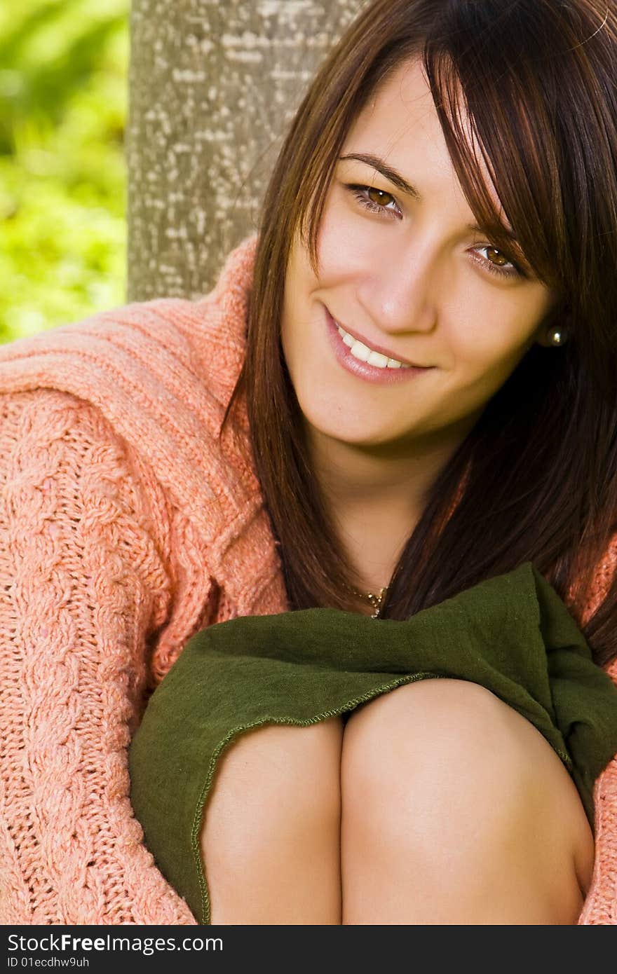 Young beautiful woman posing in a forest. Young beautiful woman posing in a forest.