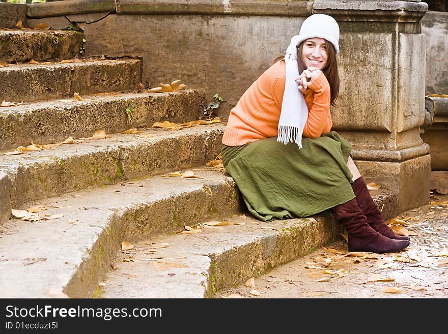 Young happy woman wearing winter clothing.