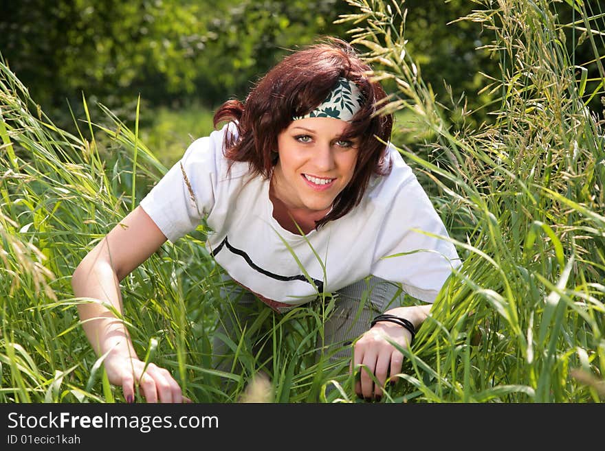 Young woman in grass