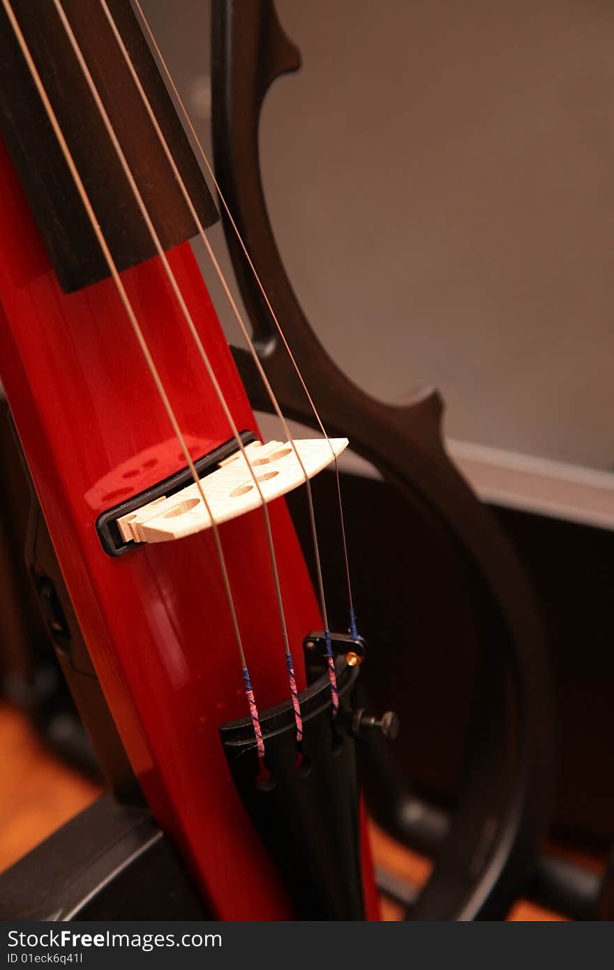 Fragment of violin on dark