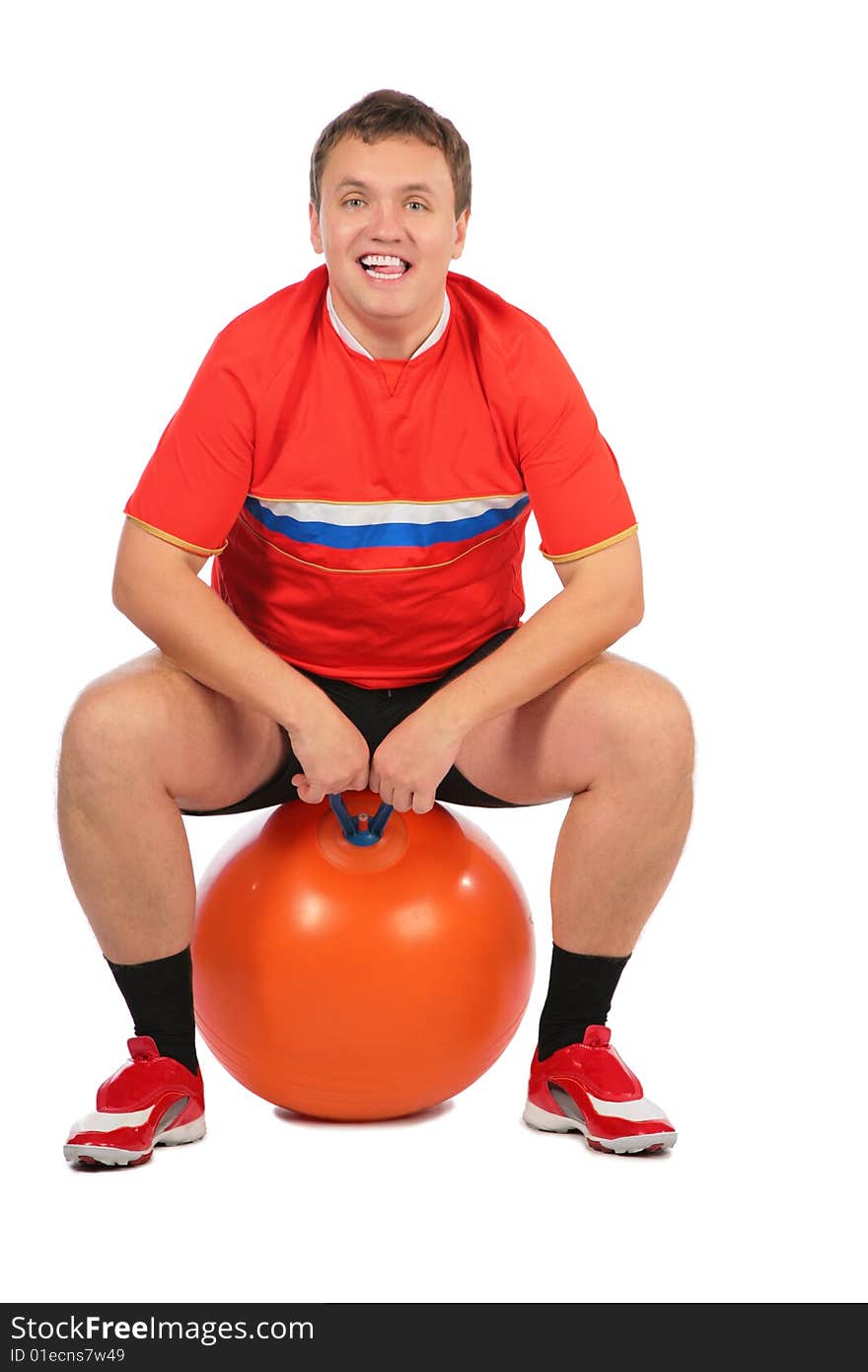 Man Sitting On A Fitness Sphere.