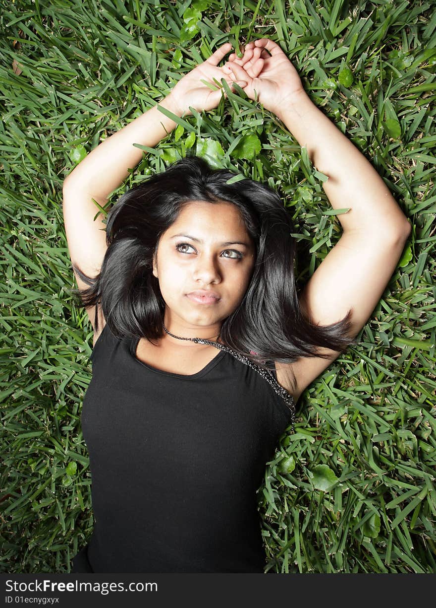 Young woman on grass