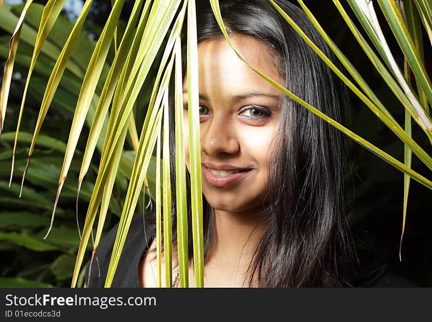 Woman Behind A Frond