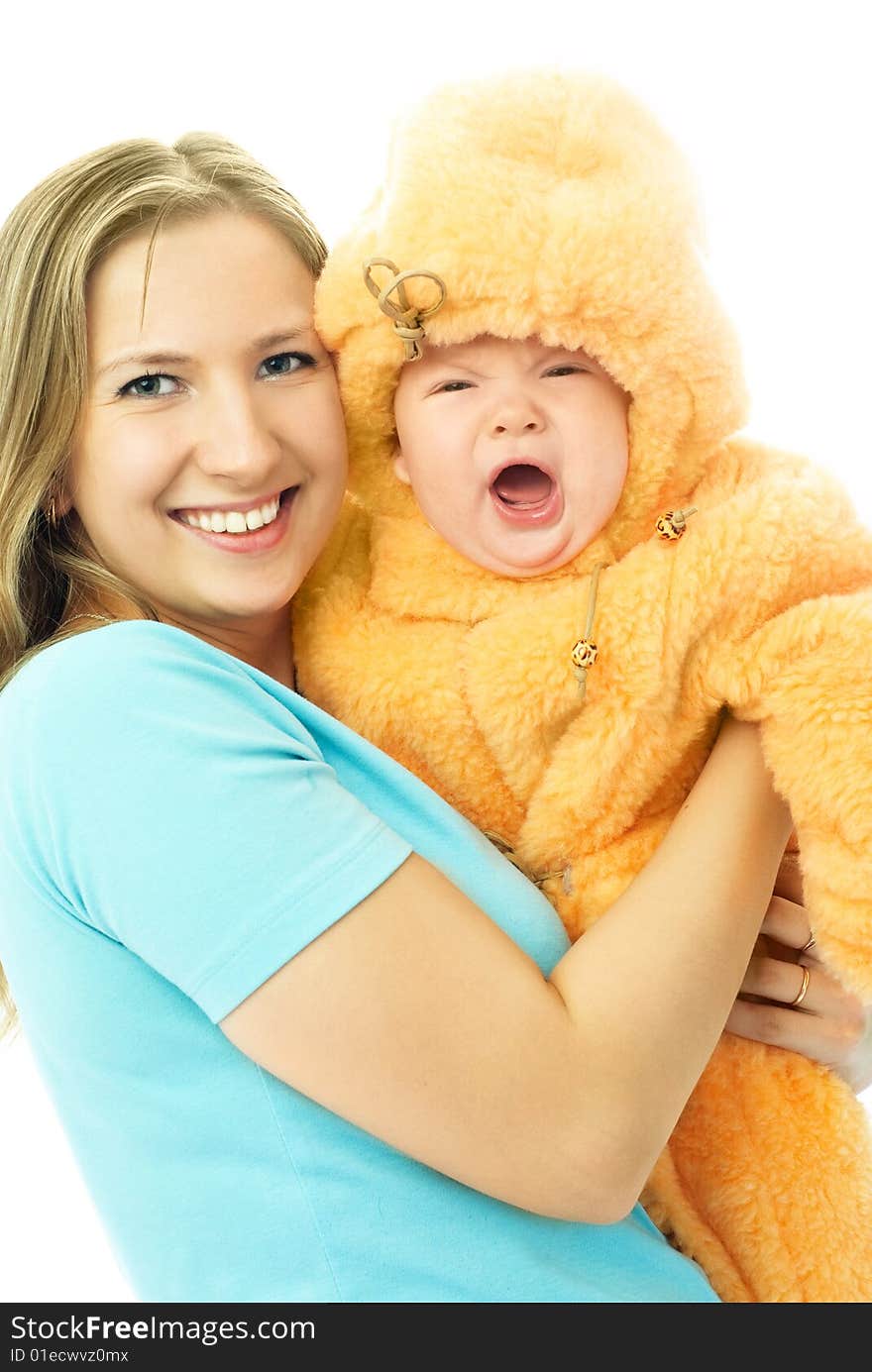 Young beautiful mother holding a crying baby. Young beautiful mother holding a crying baby