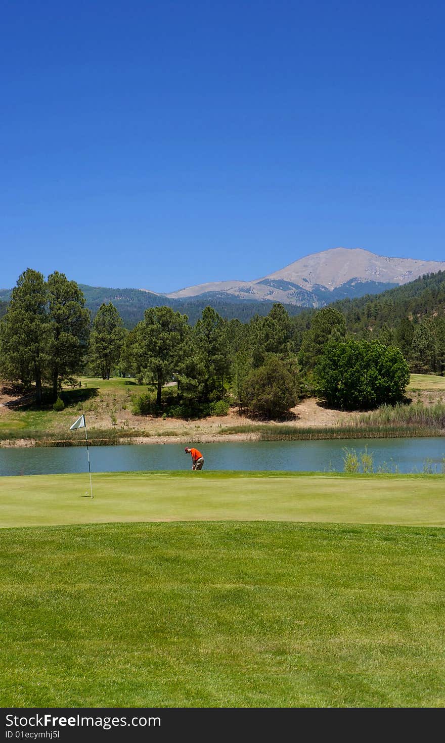 An image of a golfer preparing to swing on an Arizona course. An image of a golfer preparing to swing on an Arizona course