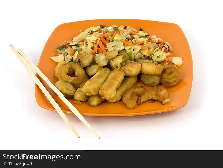 Plate with heap of seafood and vegetables with chopsticks. Isolated on pure white. Plate with heap of seafood and vegetables with chopsticks. Isolated on pure white.