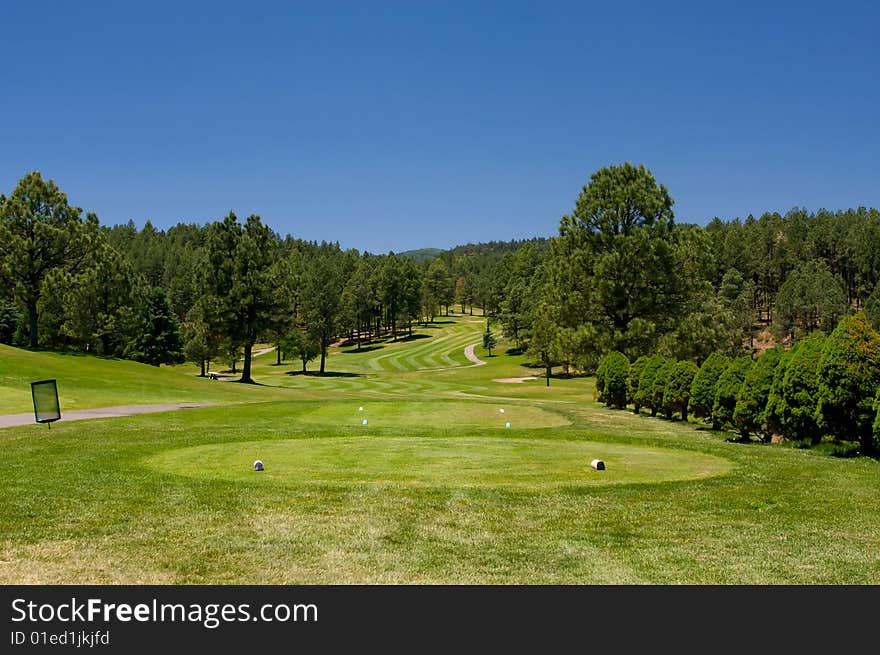 An image of  an Arizona golf course on a bright summer day. An image of  an Arizona golf course on a bright summer day