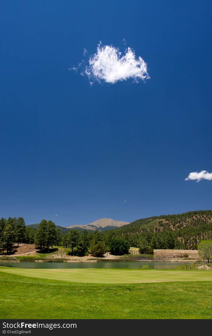 A vibrant image of a golf hole in Arizona. A vibrant image of a golf hole in Arizona