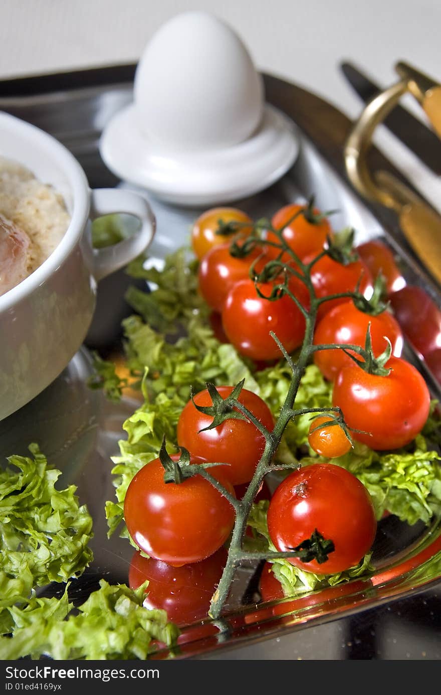 Close up english breakfast with tomato in focus