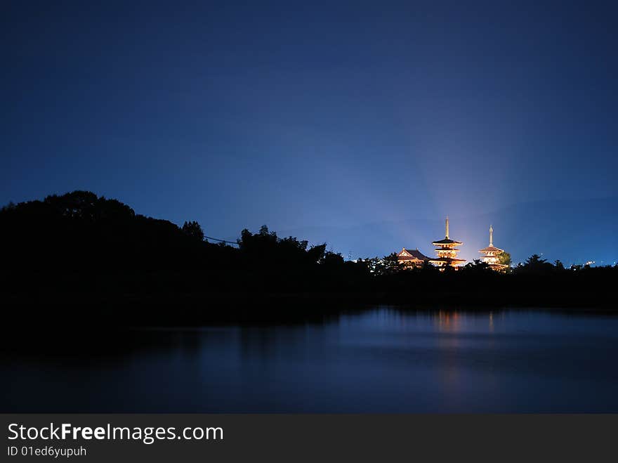 Night view of temple with light radiating, Nara, Japan