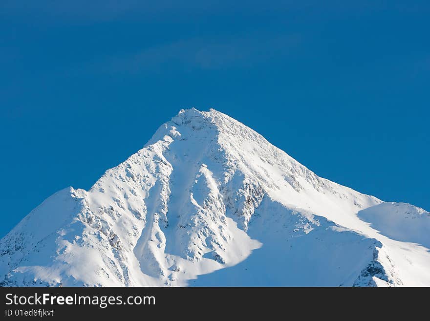 Glacier, peak in winter mountains. Glacier, peak in winter mountains.